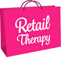 words retail therapy on a shopping bag